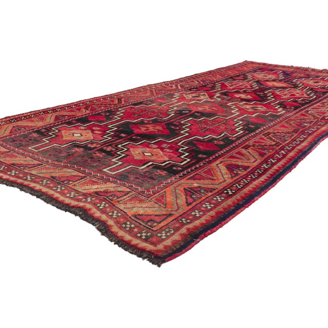 61221 Vintage Persian Shiraz Rug, 04'05 x 09'03. Full of tiny details and nomadic charm, this hand knotted wool vintage...