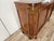 An elegant Art Nouveau sideboard from the early 20th century, crafted from walnut with a refined exposed grain and...