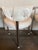 Restored Mid Century Modern Chrome dining chairs with 3 legs. Newly upholstered in white faux patent leather with self...
