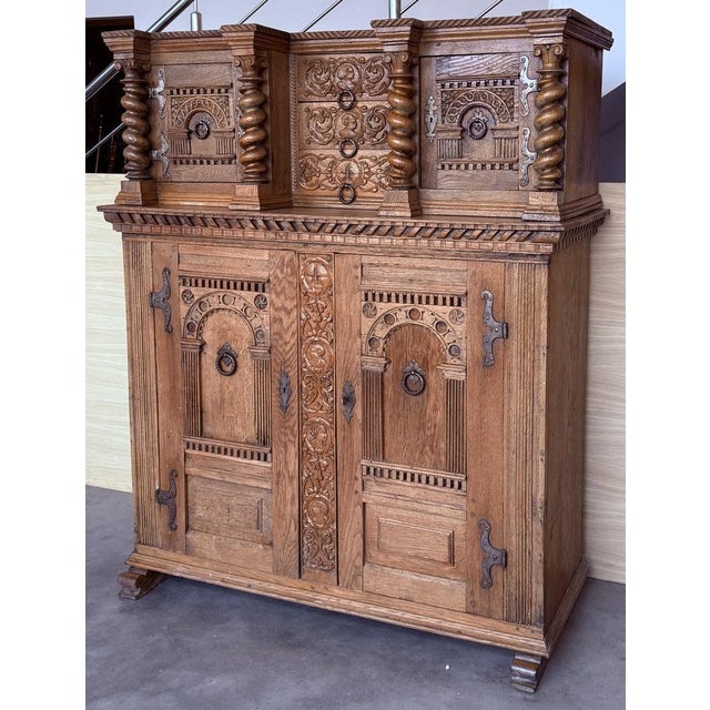 This vintage boho Dutch cabinet is a beautifully hand-carved piece that blends old-world craftsmanship with eclectic...