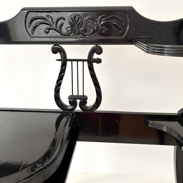 The graceful lines and lovely details are a rare find for this chic Duncan Phyfe telephone table. The piece has weight and...