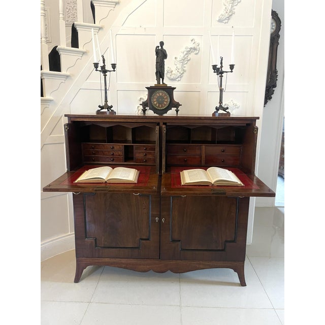 Unusual Antique George III quality figured mahogany double secretaire desk having a figured mahogany crossbanded top above...