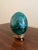 A stunning Russian style large malachite egg on Neoclassical style stand with paw feet Late 20th century Solid malachite...