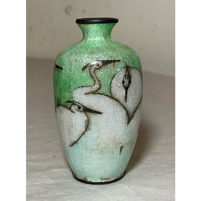 Up for sale is a high quality antique 19th century miniature Japanese Meiji foil vase. It features a detailed crane design...