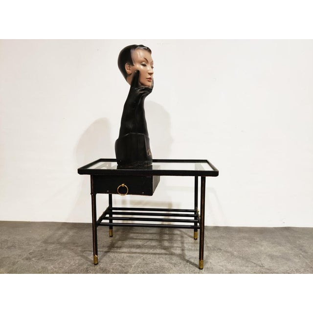 Beautiful and intriguing advertising statue for Christian Dior. This would have been used on a shop counter or to draw...