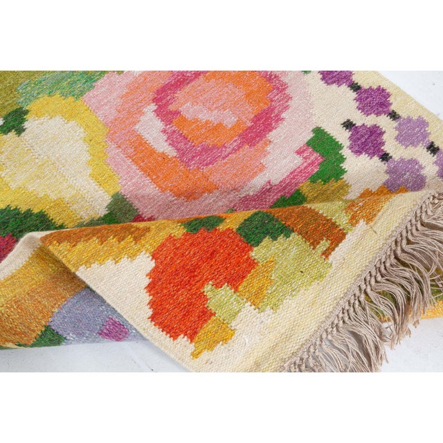 Vintage Swedish floral design flat woven rug by Ingegerd Silow Size: 2'9" × 4'1" (83 × 124 cm) This charming vintage...