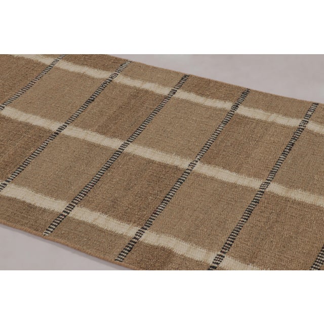 Handwoven in a sustainable blend of hemp, linen, and New Zealand wool, this 3x5 flatweave is a premier selection from the...