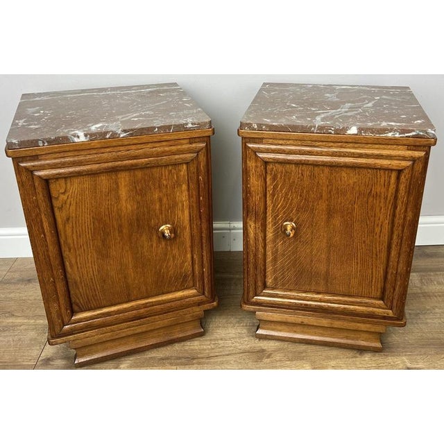 Add timeless French elegance to your interior with this attractive pair of Antique French bedside tables. Featuring...