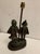 Charming spelter bedside lamp decorated with a motif of two children wearing capes good condition dimensions: h 24 x w 15...