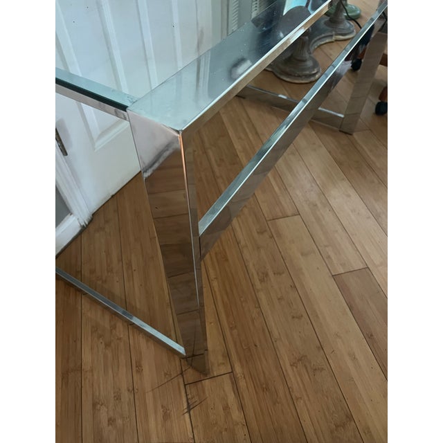 Up for consideration is a beautiful chrome and glass mid century modern table. This would look lovely on display in your...