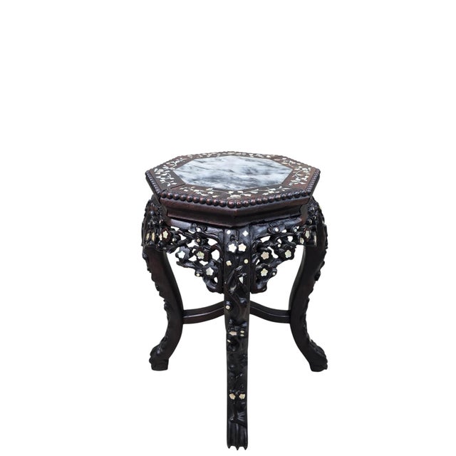 Antique Chinese Carved Hardwood Side Table with Marble Insert & Mother-of-Pearl Inlay A beautifully crafted Chinese carved...