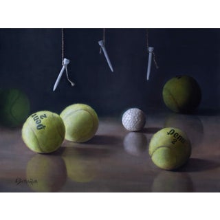 Help Has Arrived by Kelly Birkenruth | Oil on panel Still life of tennis and golf balls For Sale