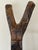 A wooden ladder hewn from a single tree used by the Dogon people to access elevated grain bins. A large sturdy example...