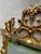 A single vintage rectangular shaped wall mirror with gold chinoiserie style frame.