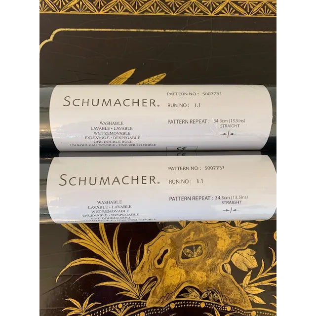 Bone Frame mimics the look of an heirloom accessory. This wallcovering echoes panels of bone inlay pieced by hand, and is...