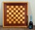 This vintage c.1950's/60's hand crafted, solid wood chess board features a classic 24 by 24 inch playing surface with 2 by...