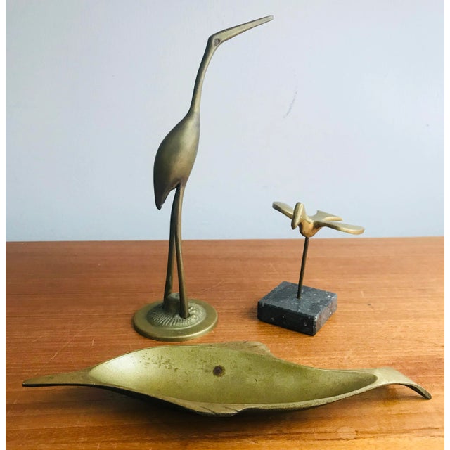 Brass Menagerie An Egret, a Dolphin and a Dove. Start your mod brass collection here and now. Egret: 7.5" tall x 4" wide x...