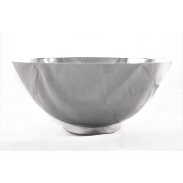 Just a sleek and modern bowl with no decorations. Designed at the height of the midcentury Minimalist movement, this bowl...