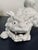 A vintage blanc de chine Foo Dog or Shishi guardian lion produced by the Otagiri Mercantile Company (OMC) in Japan during...