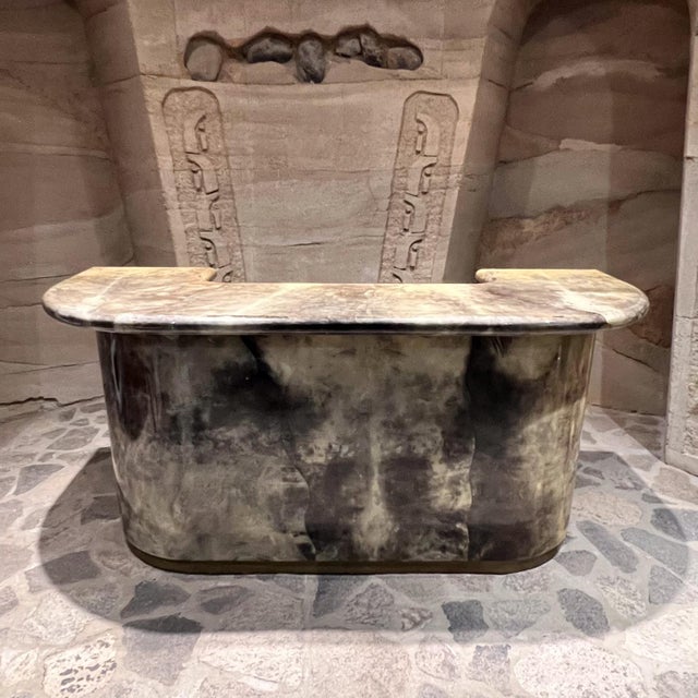 AMBIANIC presents 1970s after Aldo Tura Lacquered Goatskin Bar Reception Desk unmarked 38.5 h x 81 w x31 d Lower shelf...
