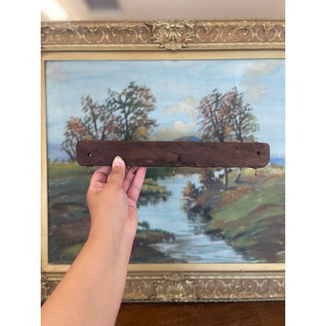 This unique piece began its life as a traditional wooden textile stamp mold, likely used for block printing fabric. Hand-...