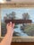 This unique piece began its life as a traditional wooden textile stamp mold, likely used for block printing fabric. Hand-...