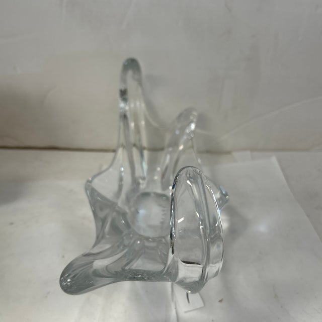 Beautiful free form bowl that resembles a gondola in crystal. Can use it to hold nuts and candy or even keys. A chic...