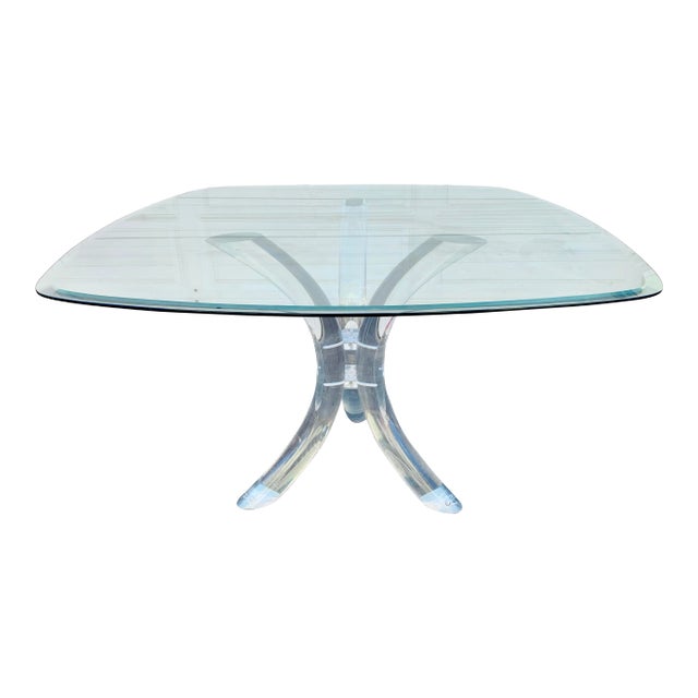 This is an amazing vintage sculptural lucite dining table. Glass top is square with rounded edge. Minor wear and signs of...