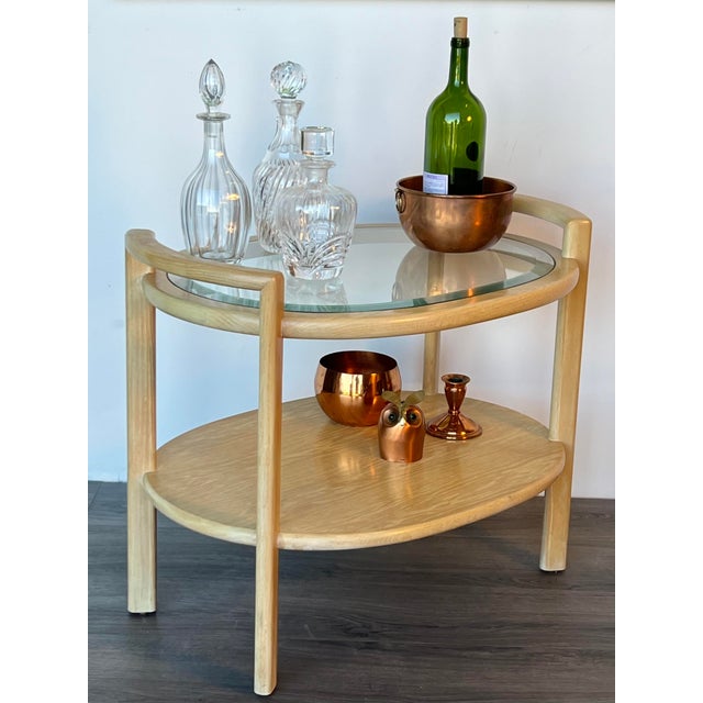 1970,s solid built two-tiered bar cart with glass top This bar cart has minor wear and overall is great vintage condition...