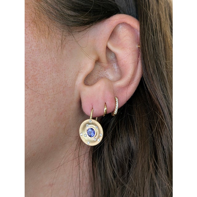 Add a touch of everyday luxury with these stunning huggie earrings, crafted from solid 14K real yellow gold and featuring...
