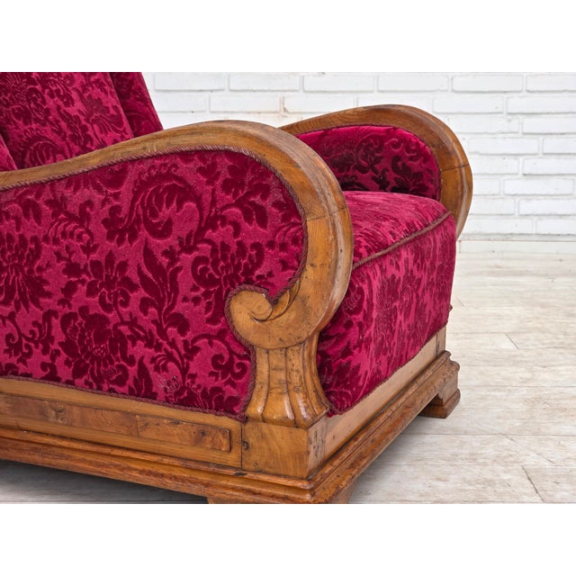 1950s, Danish relax armchair. Red furniture velour, oak wood, brass springs in the seat. The chairs were reupholstered by...