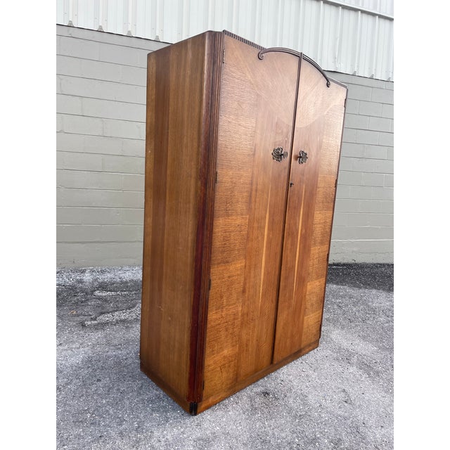Vintage double wardrobe by Austinsuite. Founded by Herschel Lewis Austin and his three brothers, Austinsuite began in 1928...