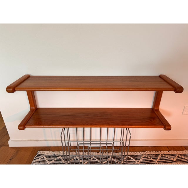 Organically shaped Danish wall shelf from the 1960s/1970s, attributed to Dyrlund (unmarked). The design is characterized...