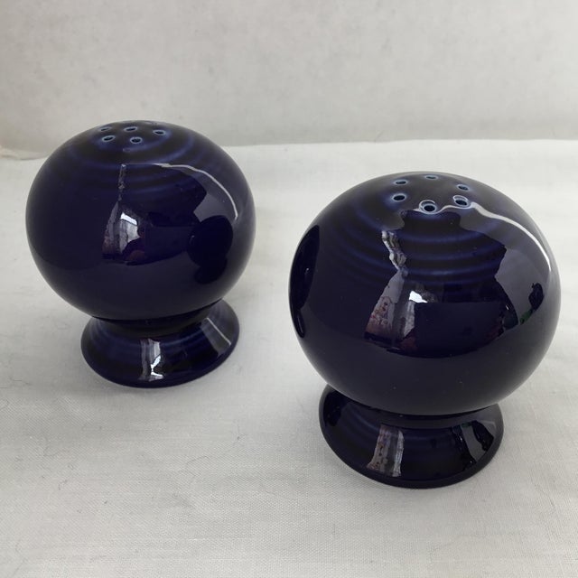 Vintage purple Fiesta-Ware salt and pepper shakers. They are beautifully crafted in dark purple, with light purple swirls....