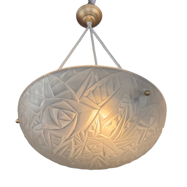 Pair of Art Deco Degué (David Guéron: 1892-1950) Pendant Lights Circa 1930 Pressed molded glass bowls decorated with...