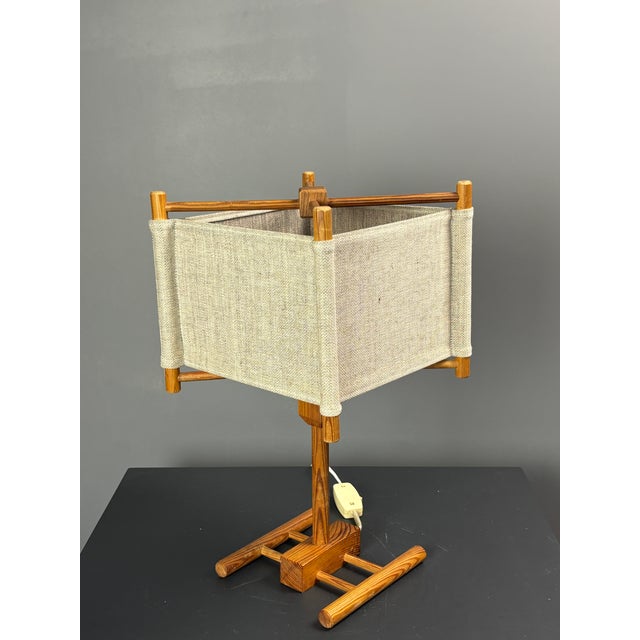 Gorgeous pine unusual table lamp with cotton shade in good vintage condition attributed to Sweden, 1970s. This table lamp...