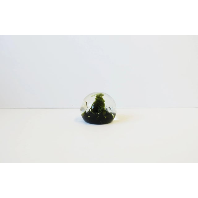 A beautiful Scottish organic modern style clear/transparent and moss green art glass paperweight or decorative object,...