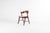 A stunning Danish Mid-Century Modern dining chair by Korup Stolefabrik, crafted from richly grained rosewood. The...