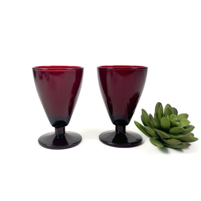 Vintage Ruby Red Cordial Glasses by Anchor Hocking. Measures 2 1/2 inches wide by 3 1/2 inches tall the base 2”