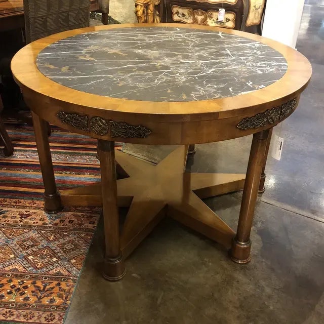 Incredible center table based on 19th century original design with Michelangelo marble inset, Vintaged brass accents and...