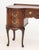 Queen Anne Style Mahogany Kidney Shaped Desk, the central drawer flanked by two rows of two drawers above cabriole legs....