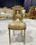 Elevate your home décor with this exquisite French Rococo accent chair. Fully refinished with radiant gold leaf, it...
