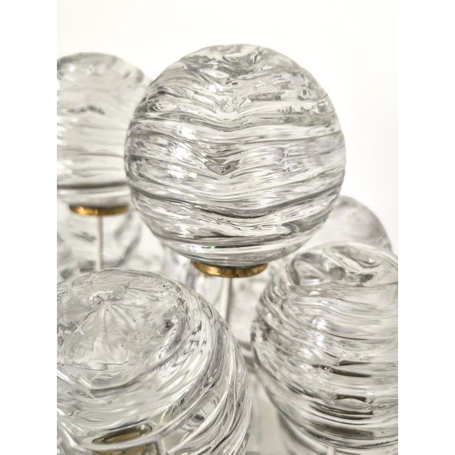 Mid Century Modern Doria Snowball ceiling light from Germany circa 1970s. Features a sculpural cluster of textured clear...