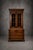 A superb Old New England-style oak housekeeper’s cabinet, combining elegant display storage with practical drawer space....
