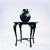 Round ebonised sidetable with a round black and white marble tabletop. Diameter 73 cm, height 63 cm The top is seperate...
