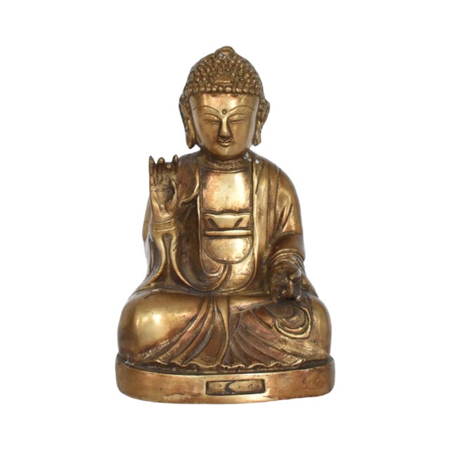 A vintage solid brass Blessing Buddha statue in the Tibetan style. 4.5"x3.5"x7.5
