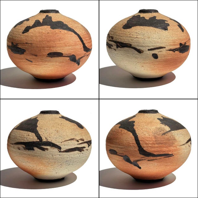 Classic piece of pottery from the Heino studio, circa 1996. Wonderful, wheel thrown, squat form vase....truly a trademark...