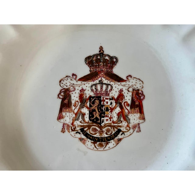 An exceptional mid-18th century Chinese export armorial porcelain dish, produced during the Qianlong period (1736–1795),...