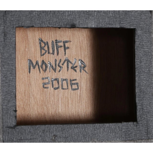 Turbo Lover Buff Monster Year: 2006 Size: 10 in. x 10 in. Framed size: 11.5 x 11.5 inches Acrylic and spray paint on...