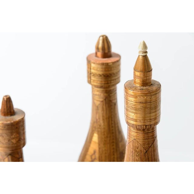 Just in this exceptional and rare collection of seven French 18Th C. Straw Marquetry Bottles. These were made by convicts...